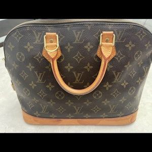 Louis Vuitton Alma Voyage MM Bag
